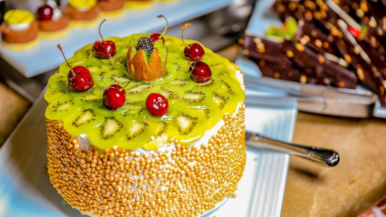 Titanic Palace Families And Couples Only Hurghada Exterior photo A cake